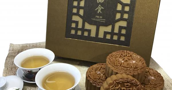 明天买《新明》，送品食月饼。